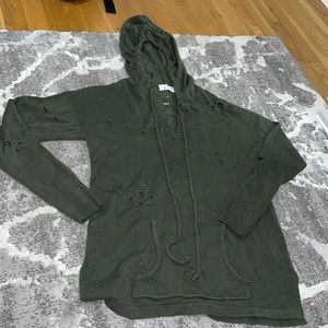 green hood cut out sweater